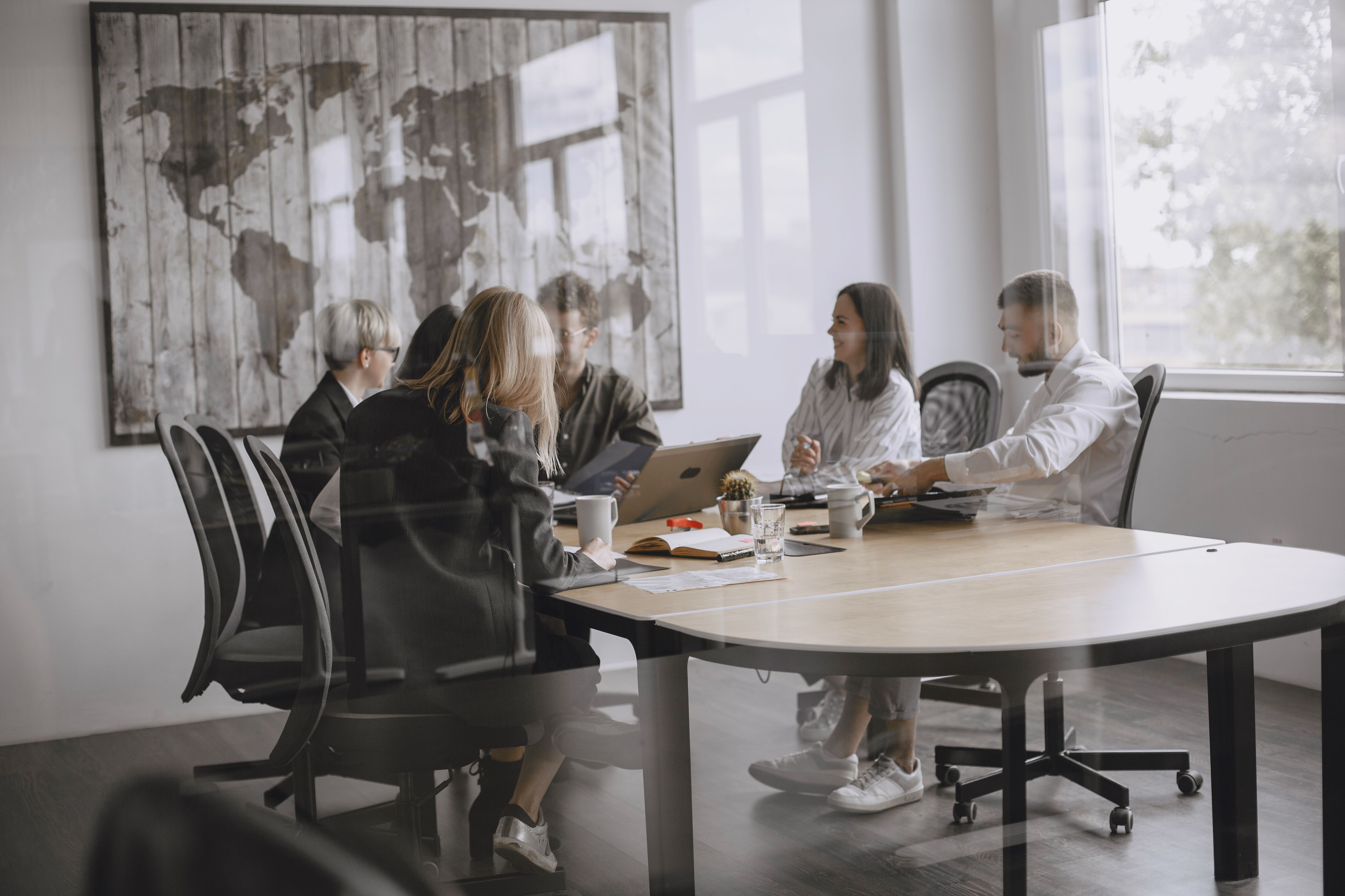 A team meeting around a table in an office